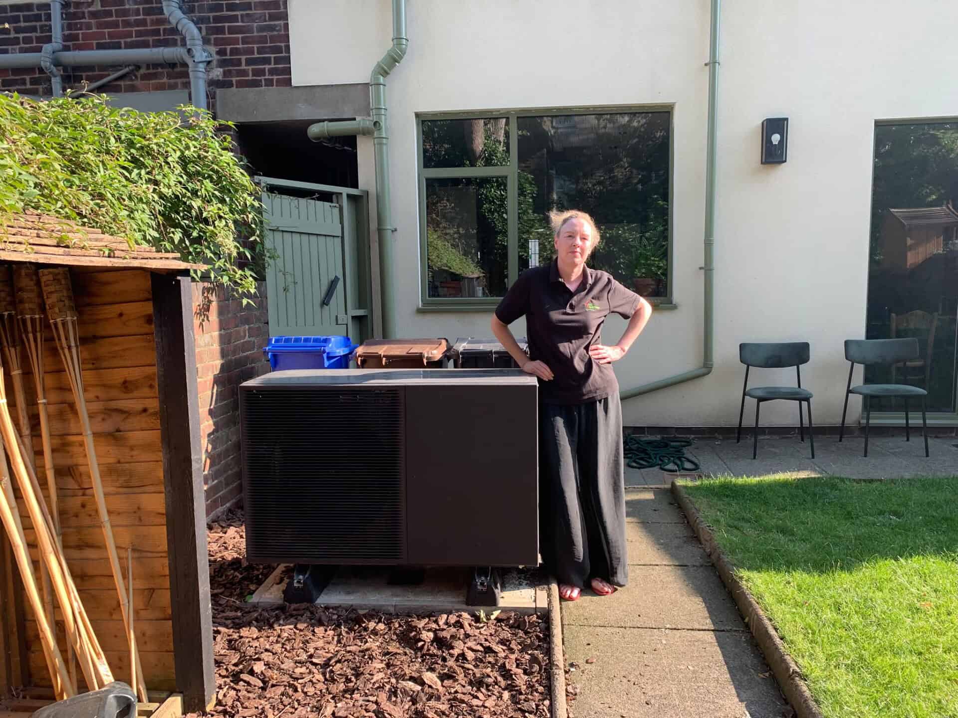 Rear view of Emma Bohan's Sheffield home showing the Samsung EHS air source heat pump installed in the garden alongside the renovated property.